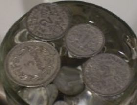 Floating-Aluminum-Coins-On-Water
